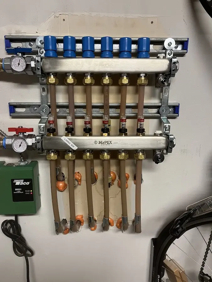 Plumber performing Water Heater Repair at a residential property in Campton